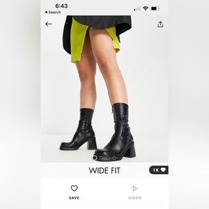 ASOS DESIGN Wide Fit Reversed mid-heel sock boots in black.